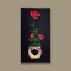 String Art Flower in Flower Pot: Black Leather Background, Red, Green, and Fawn Strings